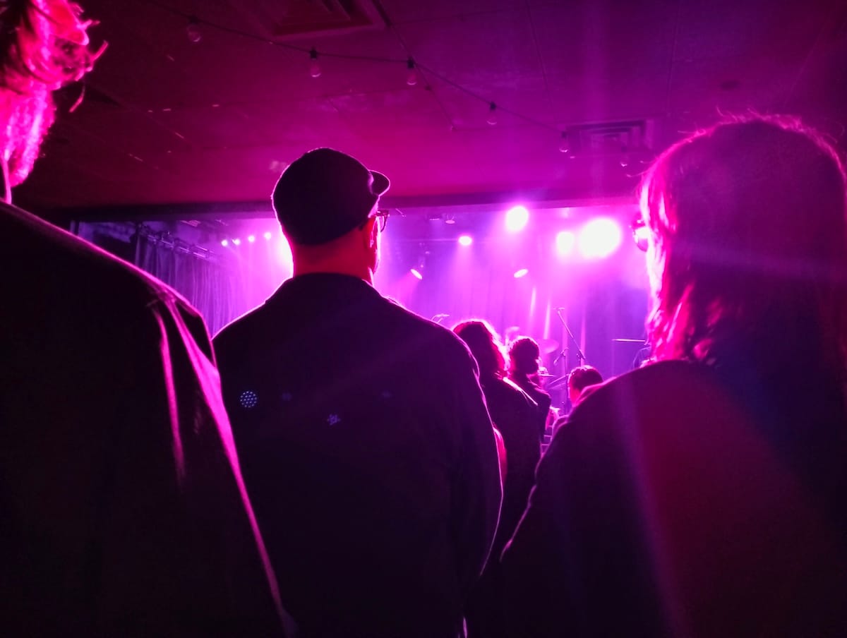 Facing a stage, except the view is blocked.