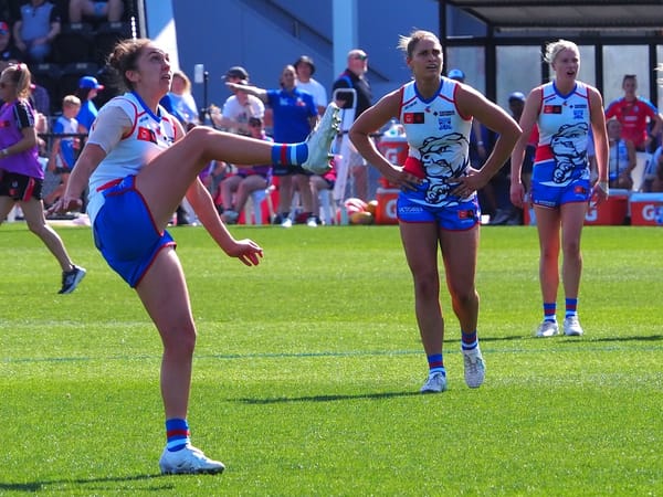 Naomi Ferres kicks a goal from a free kick